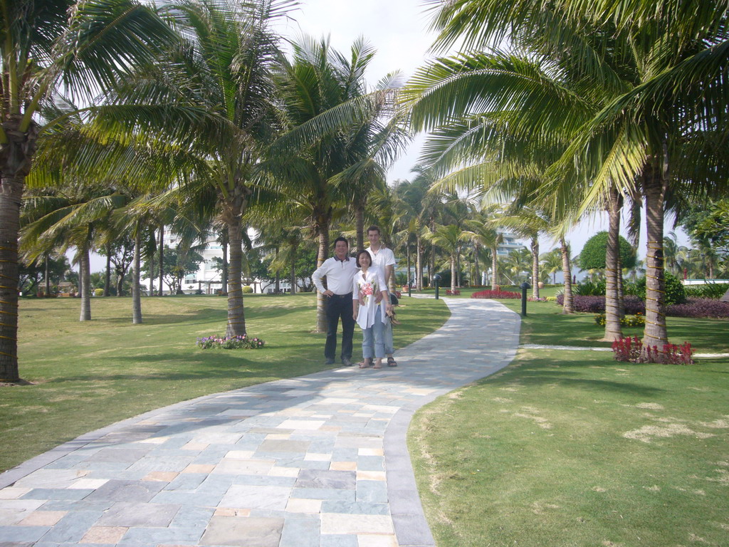 Tim and Miaomiao with a friend of Miaomiao`s father at the gardens of Gloria Resort Sanya