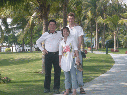 Tim and Miaomiao with a friend of Miaomiao`s father at the gardens of Gloria Resort Sanya