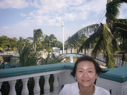 Miaomiao with a view on the swimming pool at the Gloria Resort Sanya