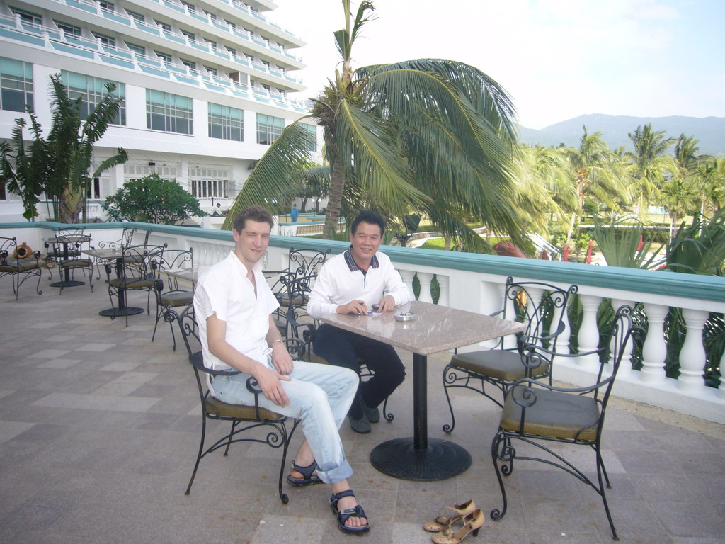 Tim with a friend of Miaomiao`s father at a terrace at the Gloria Resort Sanya