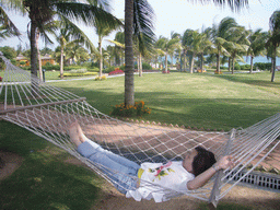 Miaomiao in a hammock at the Gloria Resort Sanya