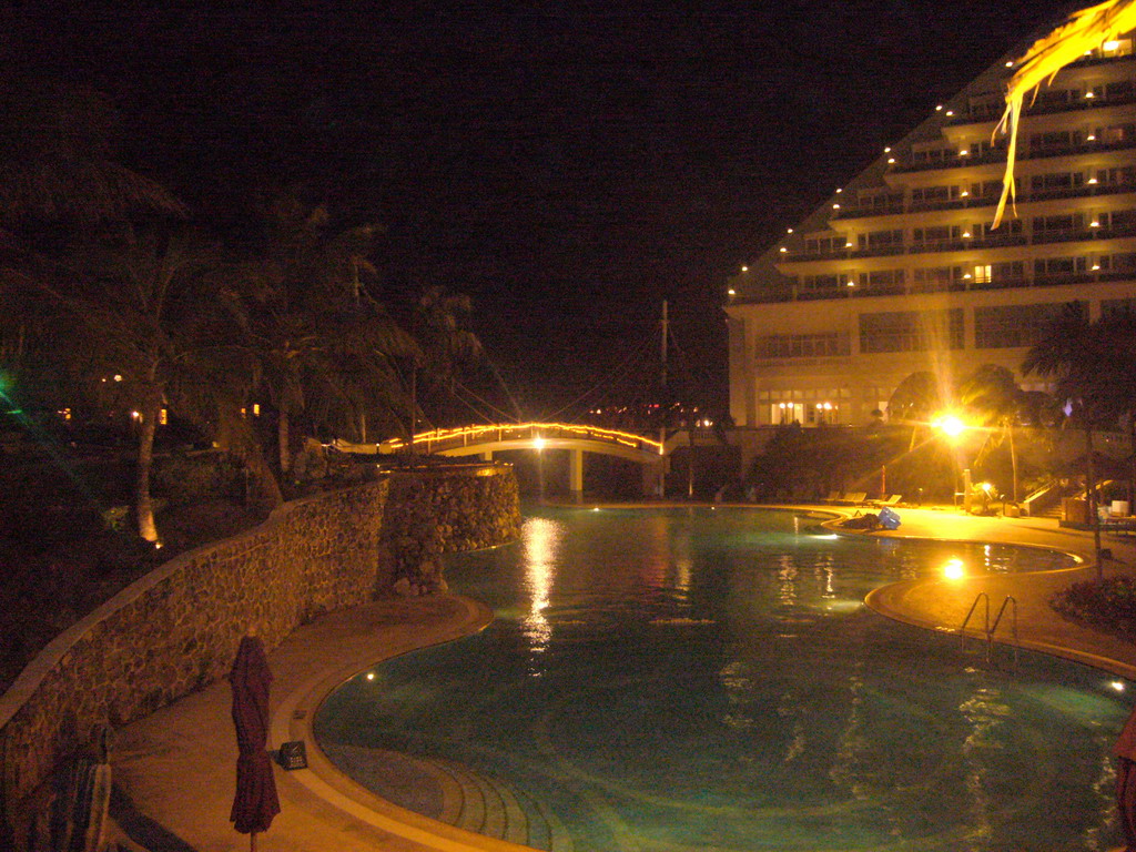 The swimming pool at the Gloria Resort Sanya, by night