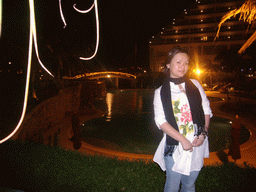 Miaomiao at the swimming pool at the Gloria Resort Sanya, by night