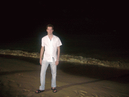 Tim at the beach of Yalong Bay, by night
