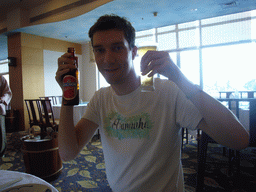Tim with Anchor beer in the restaurant of the Gloria Resort Sanya