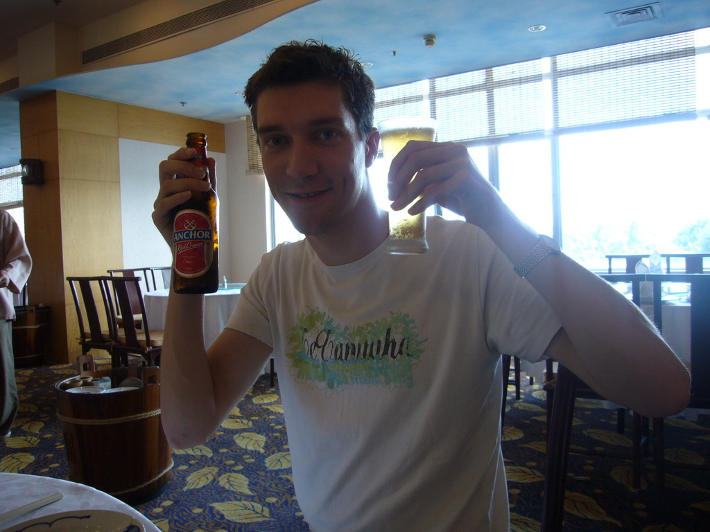 Tim with Anchor beer in the restaurant of the Gloria Resort Sanya