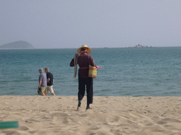 Saleswoman at the beach of Yalong Bay