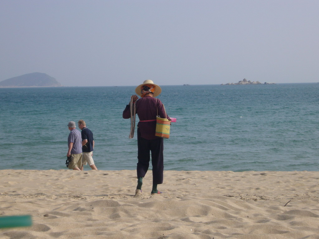 Saleswoman at the beach of Yalong Bay