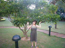 Miaomiao with tree at the gardens of the Gloria Resort Sanya