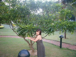 Miaomiao with tree at the gardens of the Gloria Resort Sanya