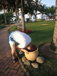 Tim with bowl at the gardens of the Gloria Resort Sanya