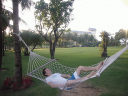 Tim in a hammock at the Gloria Resort Sanya