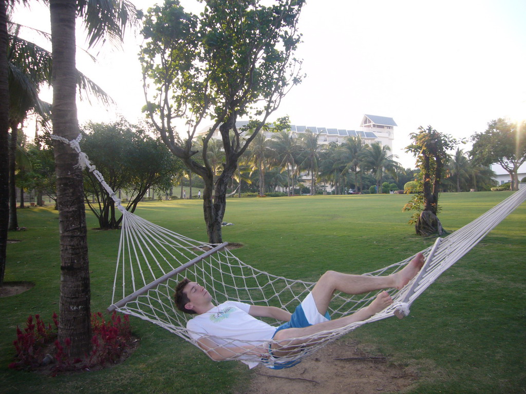 Tim in a hammock at the Gloria Resort Sanya