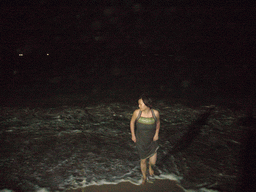 Miaomiao in the water at the beach of Yalong Bay, by night