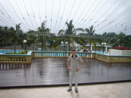 Tim in front of the swimming pool at the Gloria Resort Sanya