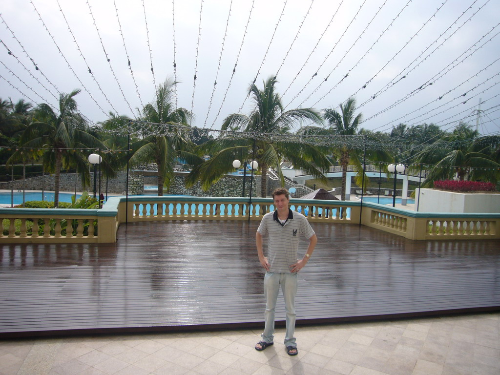 Tim in front of the swimming pool at the Gloria Resort Sanya