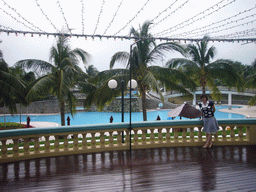 Miaomiao in front of the swimming pool at the Gloria Resort Sanya