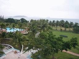 The gardens and swimming pool of the Gloria Resort Sanya and Yalong Bay, viewed from above
