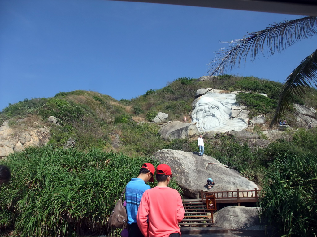 `Lao-Tse Watching the Sea` stone sculpture at the Sanya Nanshan Dongtian Park