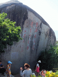 Rock with the incription of General Secretary Jiang at the Sanya Nanshan Dongtian Park