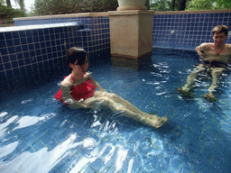 Tim and Mengjin with little fish in the Dr. Fish pool at the Fisherman`s Wharf at the Ocean Sonic Resort