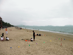 The beach in front of the Ocean Sonic Resort, and the skyline of Sanya