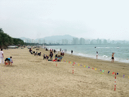 The beach in front of the Ocean Sonic Resort, and the skyline of Sanya
