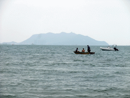 Boats in the sea in front of the Ocean Sonic Resort, with a view on the Luhuitou peninsula