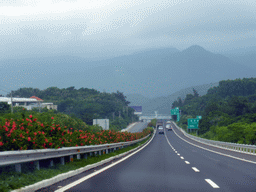 Mountains and the G98 Hainan Ring Road Expressway near Riyuewan, viewed from the car