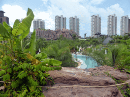 Swimming pool and rock at the Amazon Jungle Water Park at the central area of the Sanya Bay Mangrove Tree Resort