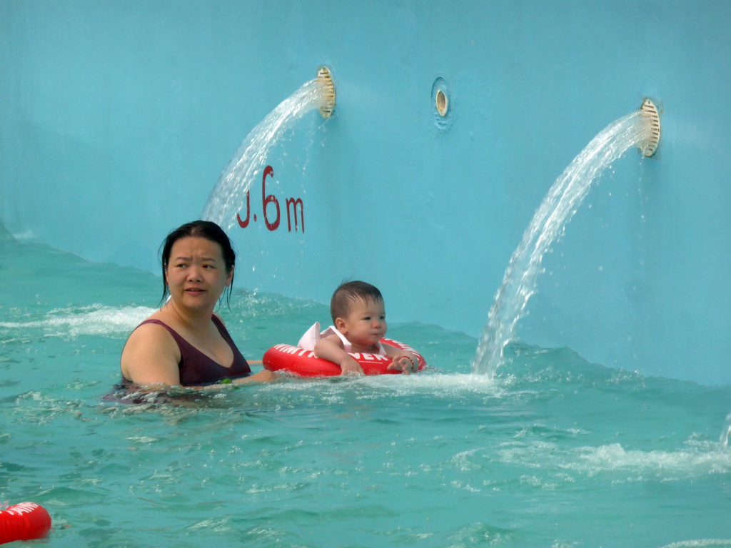 Miaomiao and Max at the swimming pool of the Amazon Jungle Water Park at the central area of the Sanya Bay Mangrove Tree Resort