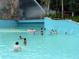 Miaomiao, Max and Miaomiao`s family at the swimming pool of the Amazon Jungle Water Park at the central area of the Sanya Bay Mangrove Tree Resort