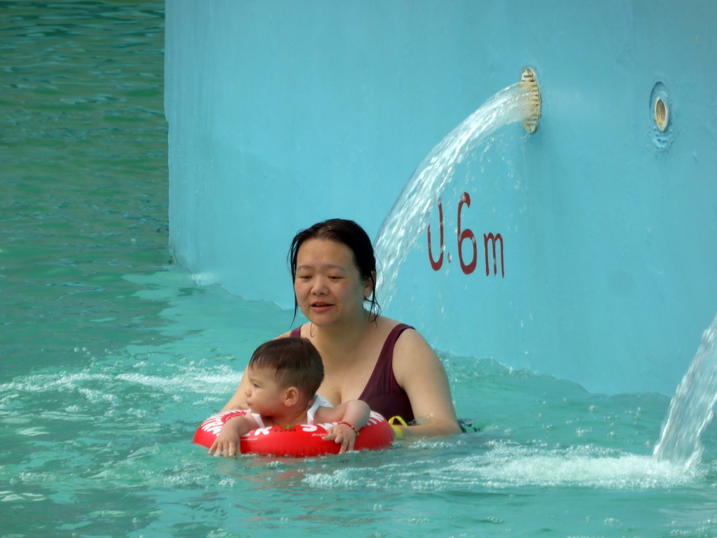 Miaomiao and Max at the swimming pool of the Amazon Jungle Water Park at the central area of the Sanya Bay Mangrove Tree Resort