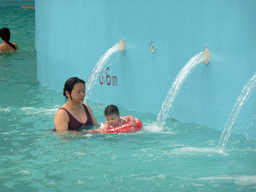 Miaomiao and Max at the swimming pool of the Amazon Jungle Water Park at the central area of the Sanya Bay Mangrove Tree Resort