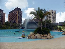 Beach, slide and swimming pool of the Amazon Jungle Water Park at the central area of the Sanya Bay Mangrove Tree Resort