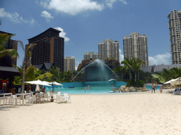 Beach, slide and swimming pool of the Amazon Jungle Water Park at the central area of the Sanya Bay Mangrove Tree Resort