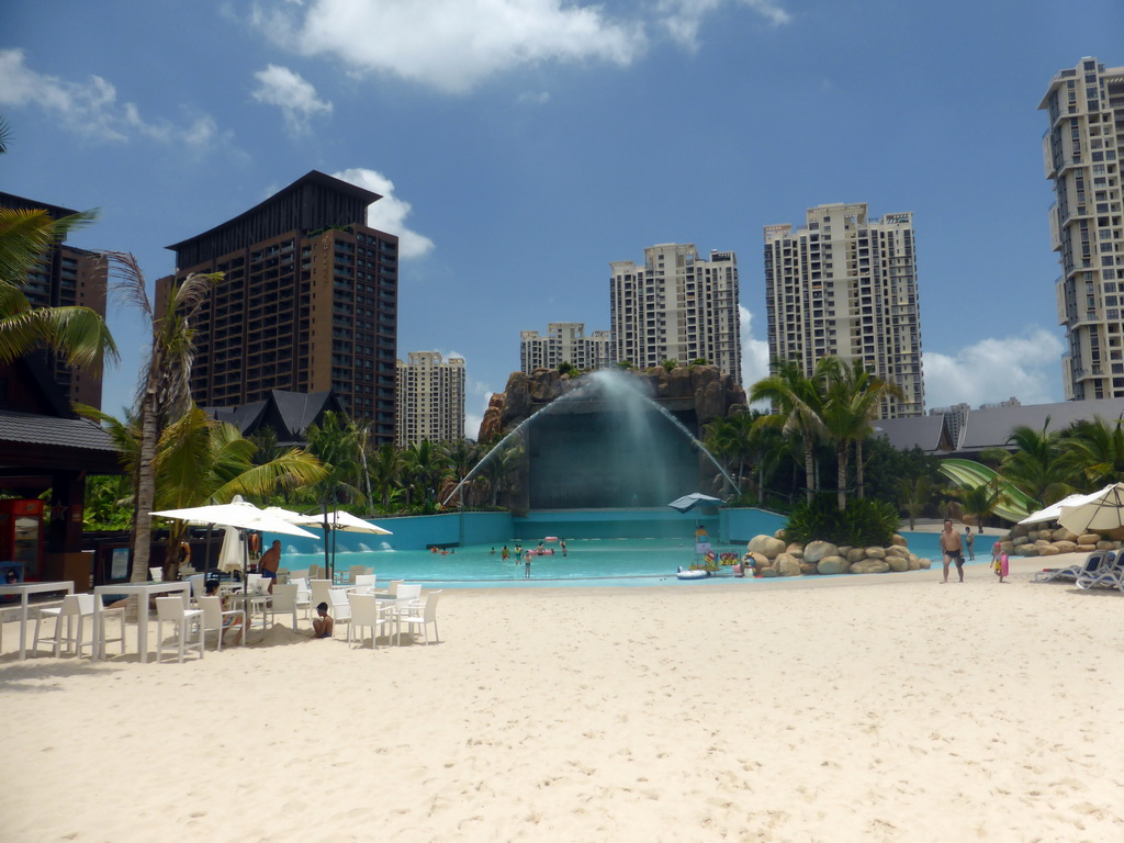 Beach, slide and swimming pool of the Amazon Jungle Water Park at the central area of the Sanya Bay Mangrove Tree Resort