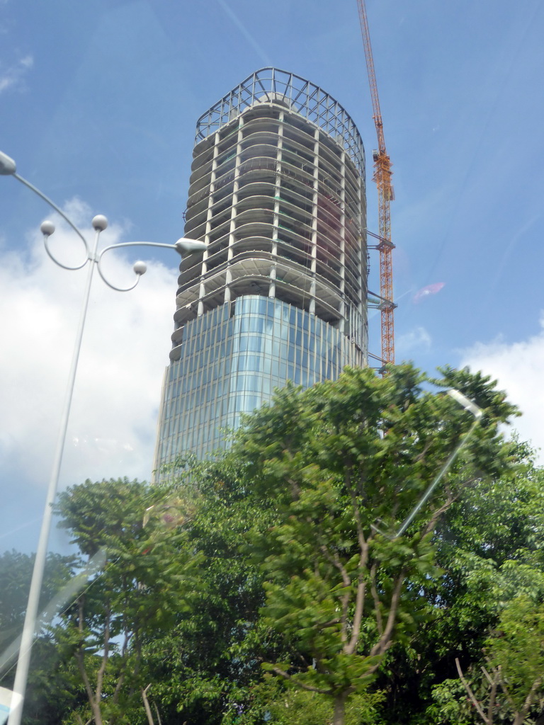 Skyscraper in the city center, viewed from the car