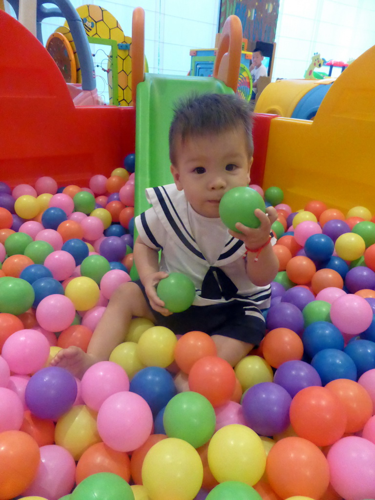 Max playing in the ball pit in the Play Room of the InterContinental Sanya Haitang Bay Resort