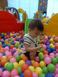 Max playing in the ball pit in the Play Room of the InterContinental Sanya Haitang Bay Resort