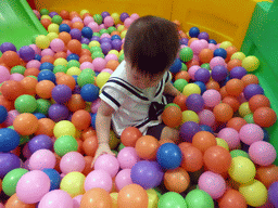 Max playing in the ball pit in the Play Room of the InterContinental Sanya Haitang Bay Resort