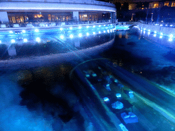 Top side and underwater tunnel of the aquarium of the Aqua restaurant at the InterContinental Sanya Haitang Bay Resort, by night