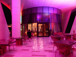 Miaomiao at the bar at the top floor of the InterContinental Sanya Haitang Bay Resort, by night