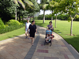 Miaomiao, Max and Miaomiao`s parents in the garden of the InterContinental Sanya Haitang Bay Resort