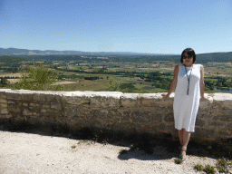 Miaomiao at a viewing point along the D1 road from Avignon, with a view on the town of Sault and surroundings