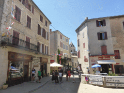 The Rue Porte des Aires street with the tower of the Notre Dame de la Tour church