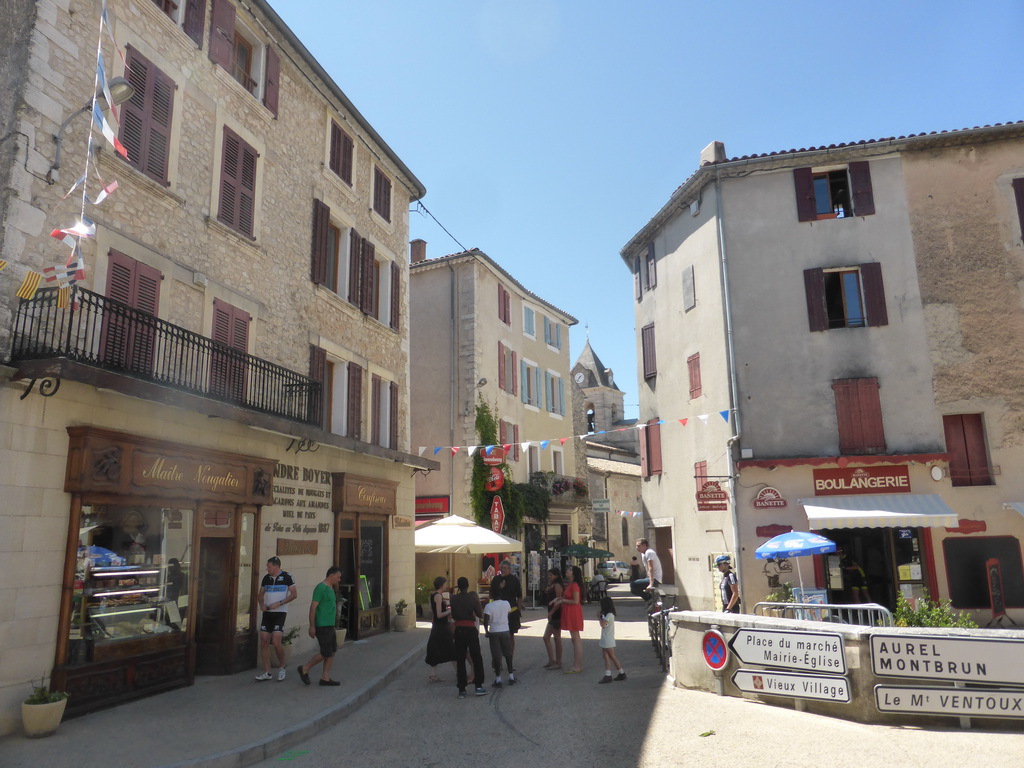 The Rue Porte des Aires street with the tower of the Notre Dame de la Tour church