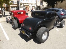 Old automobiles at the Place du Marché square