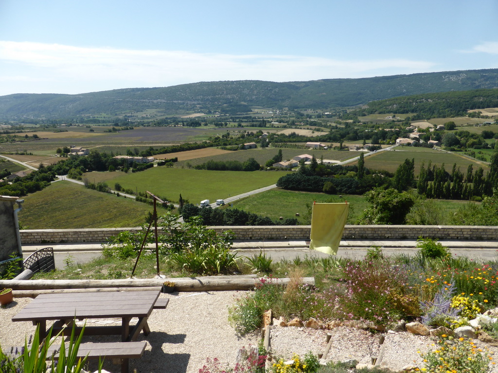 The Rue de l`Hôpital street and the countryside to the southwest of the town, viewed from the Rue Porte Sainte-Anne street