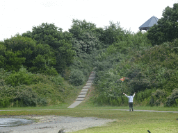 Miaomiao flying a kite at the West Repart beach